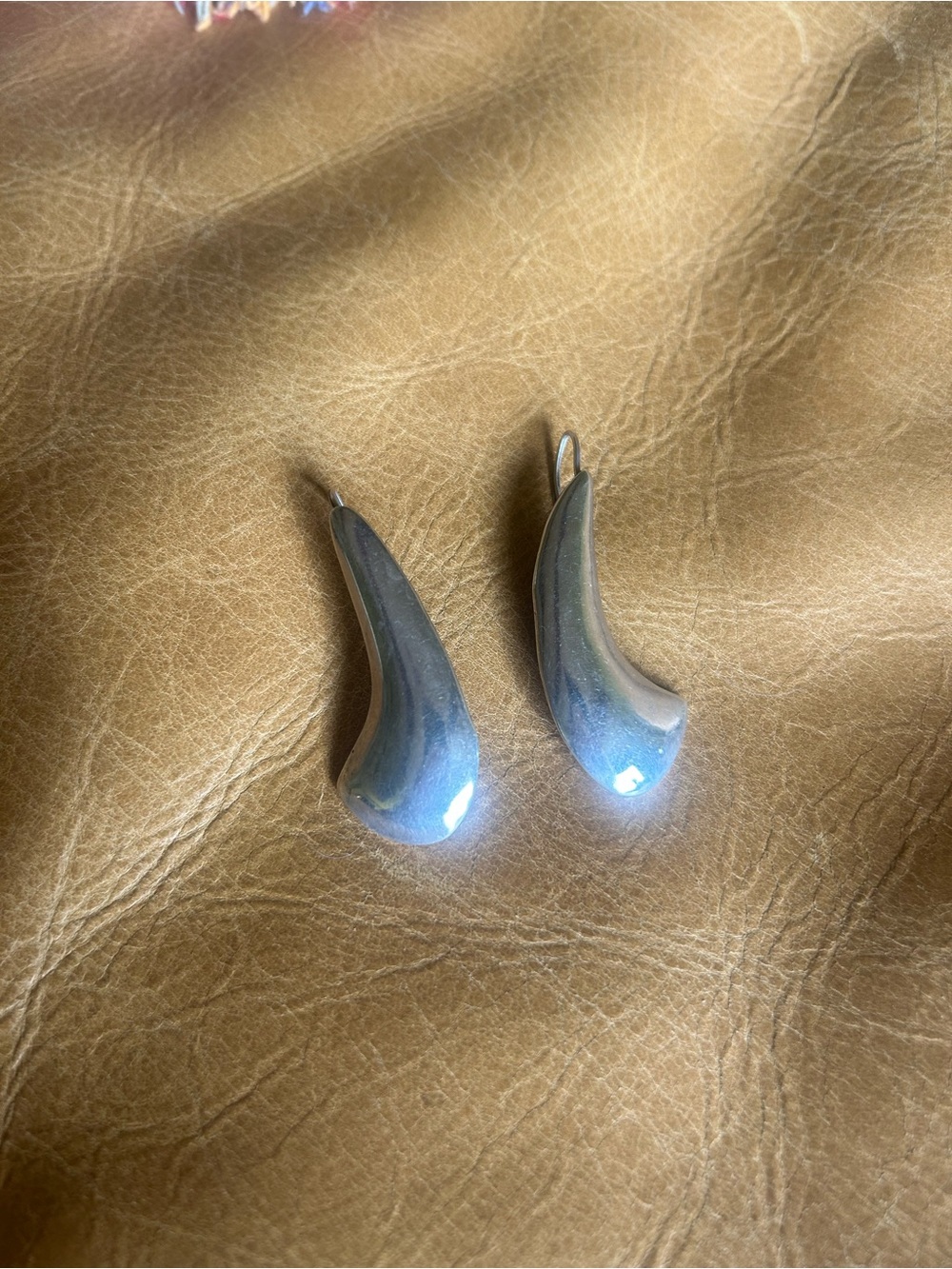 Sleek Curved Drop Earrings in Metallic Gray